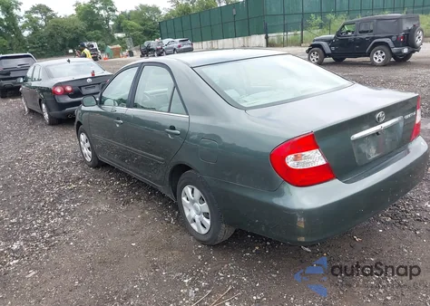 2003 Toyota Camry Le from USA, damaged, VIN 4T1BE32K73U766181